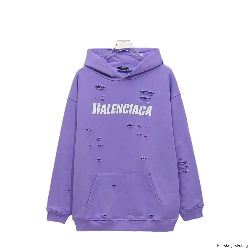 Balenciaga's ripped purple sweatshirt