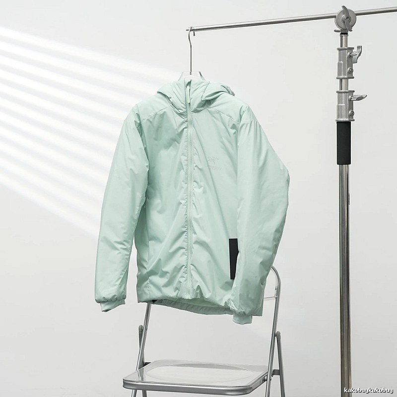 Clean Hooded Profile And Minimal Chest Branding Arc'teryx Lightweight Shell Jacket in Mint Green