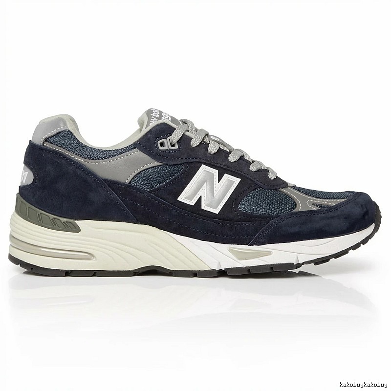 New Balance retro-style dark blue and grey sports shoes