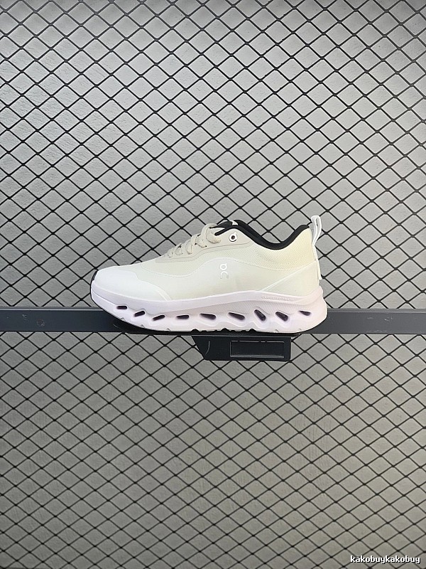 On Cloud Runners in White and Black, Finished with Layered Mesh Upper
