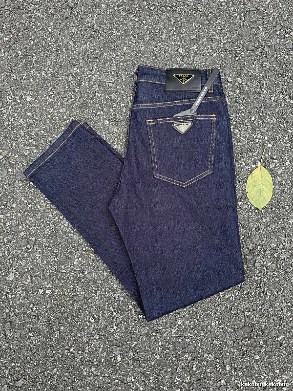 Prada Dark Indigo Logo Jeans with triangle badge hardware and contrast pocket stitching